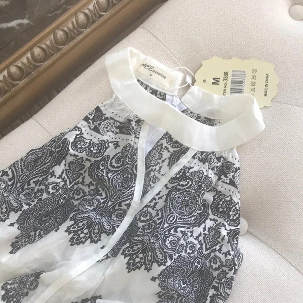 Chic Black and White Patterned Dress - Picture 3 of 7